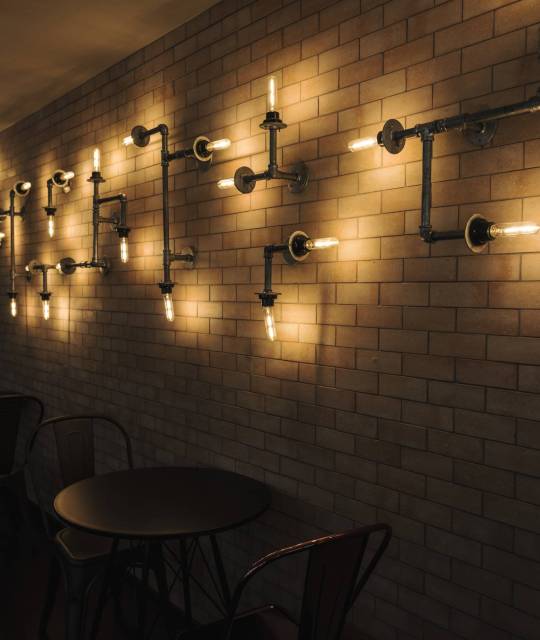 Interior of a cafe with brick walls Interior of a cafe with brick walls